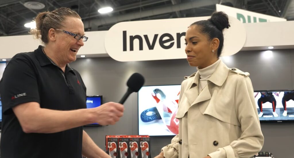 a man is interviewing a woman about her experience testing out a new product