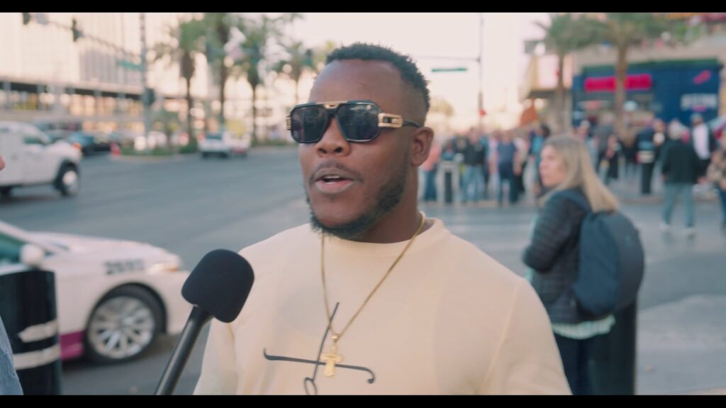an African American man on the Las Vegas strip is being interviewed