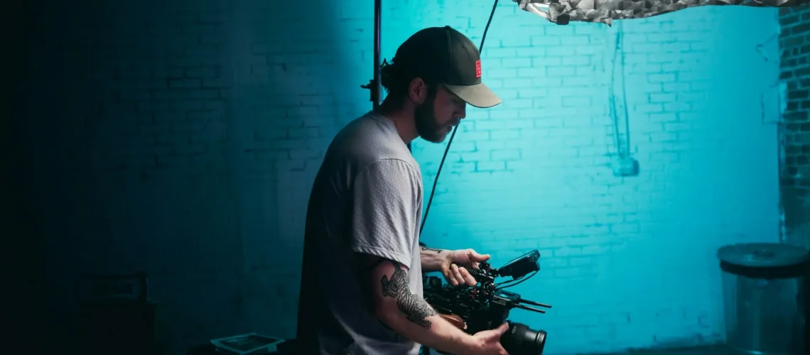 A video production crew positioning the camera to get the best angle