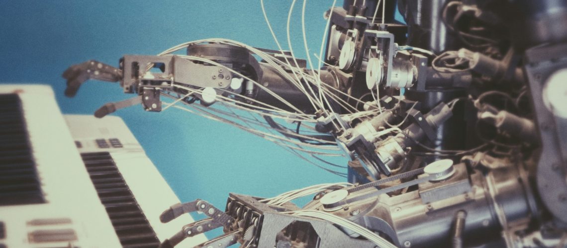 A robot typing in a computer and hiring new employees