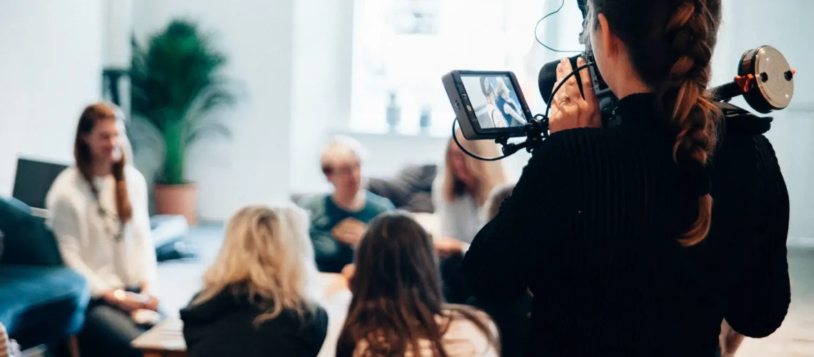 A group of customers gathered for video testimonials