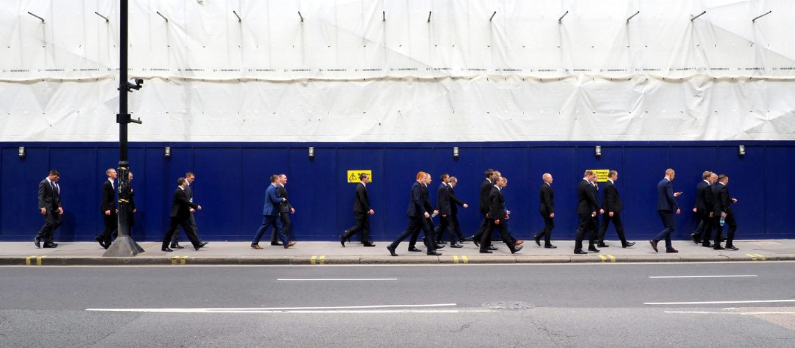 Corporate employees walking towards the corporate event
