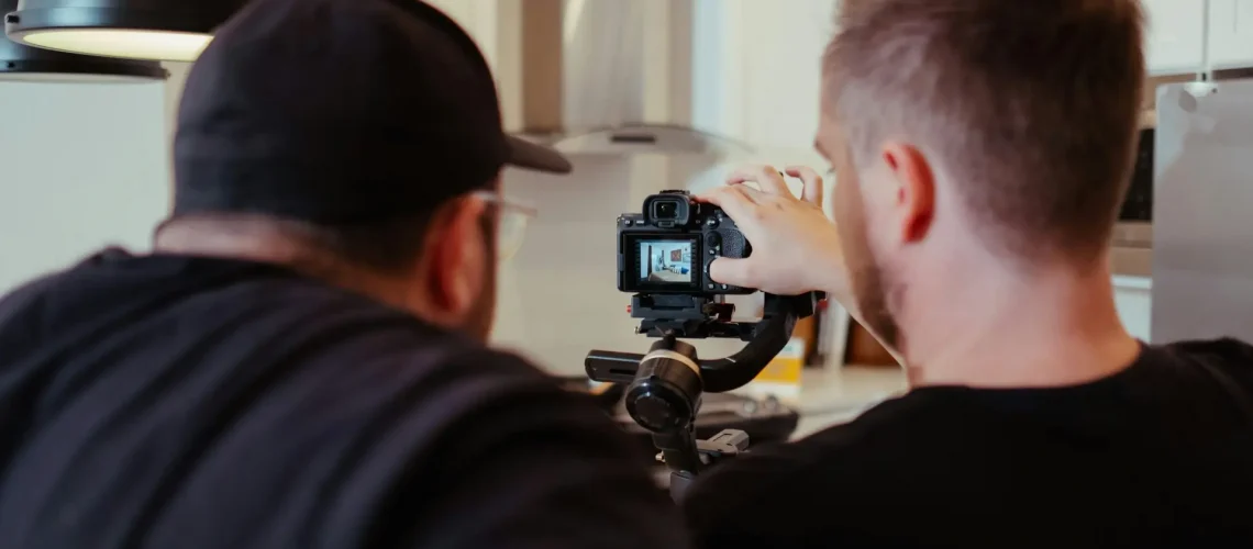 Video production director giving instructions to a crew for a video production