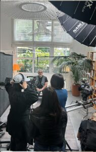 filming an interview behind the scenes