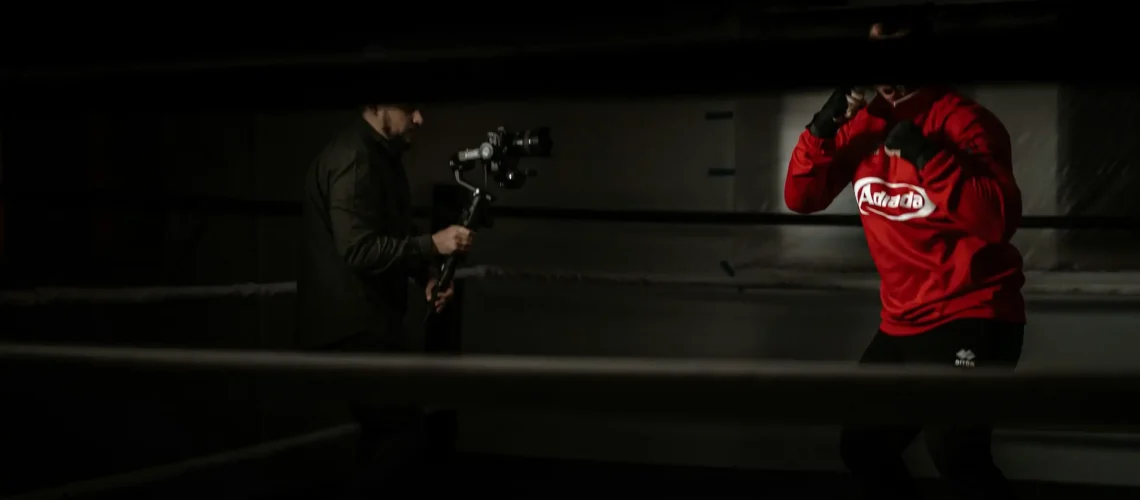 A video production director capturing the routine of an athlete