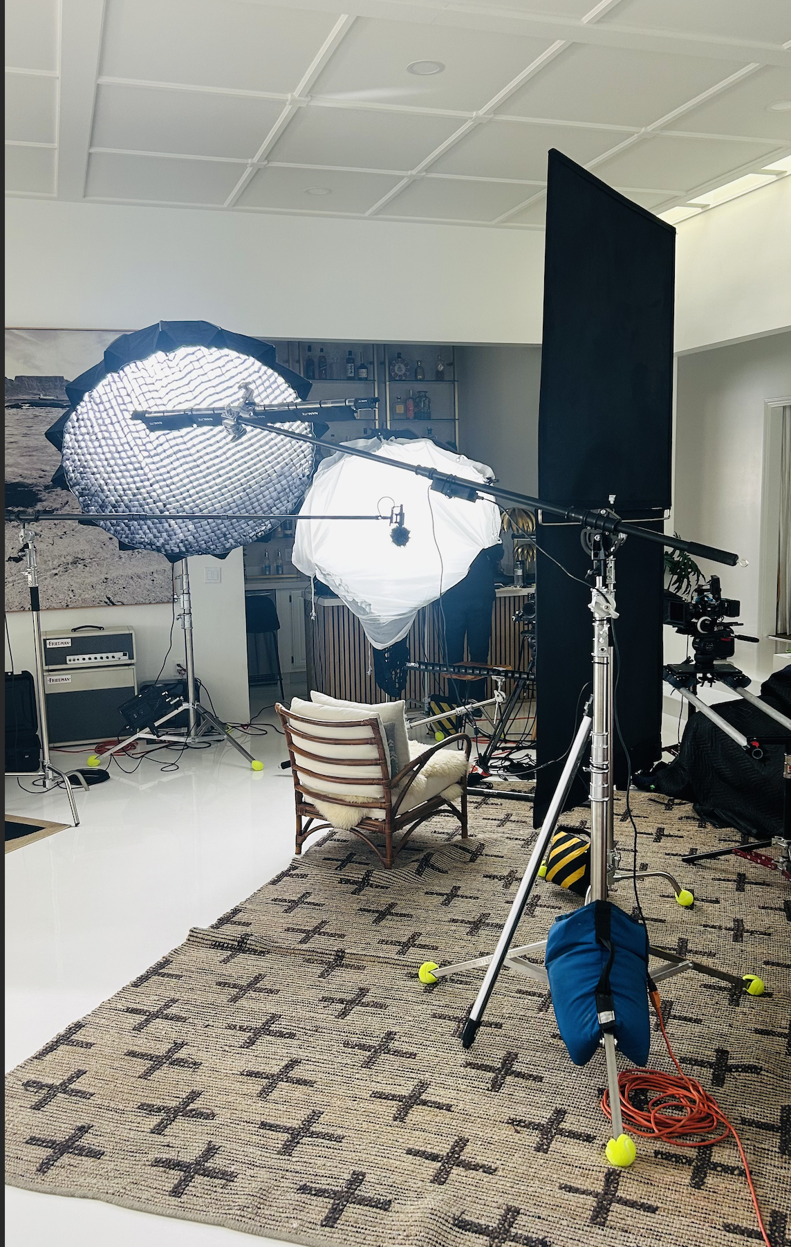 professional lighting setup with lights, c-stands, softboxes, boom poles, mic