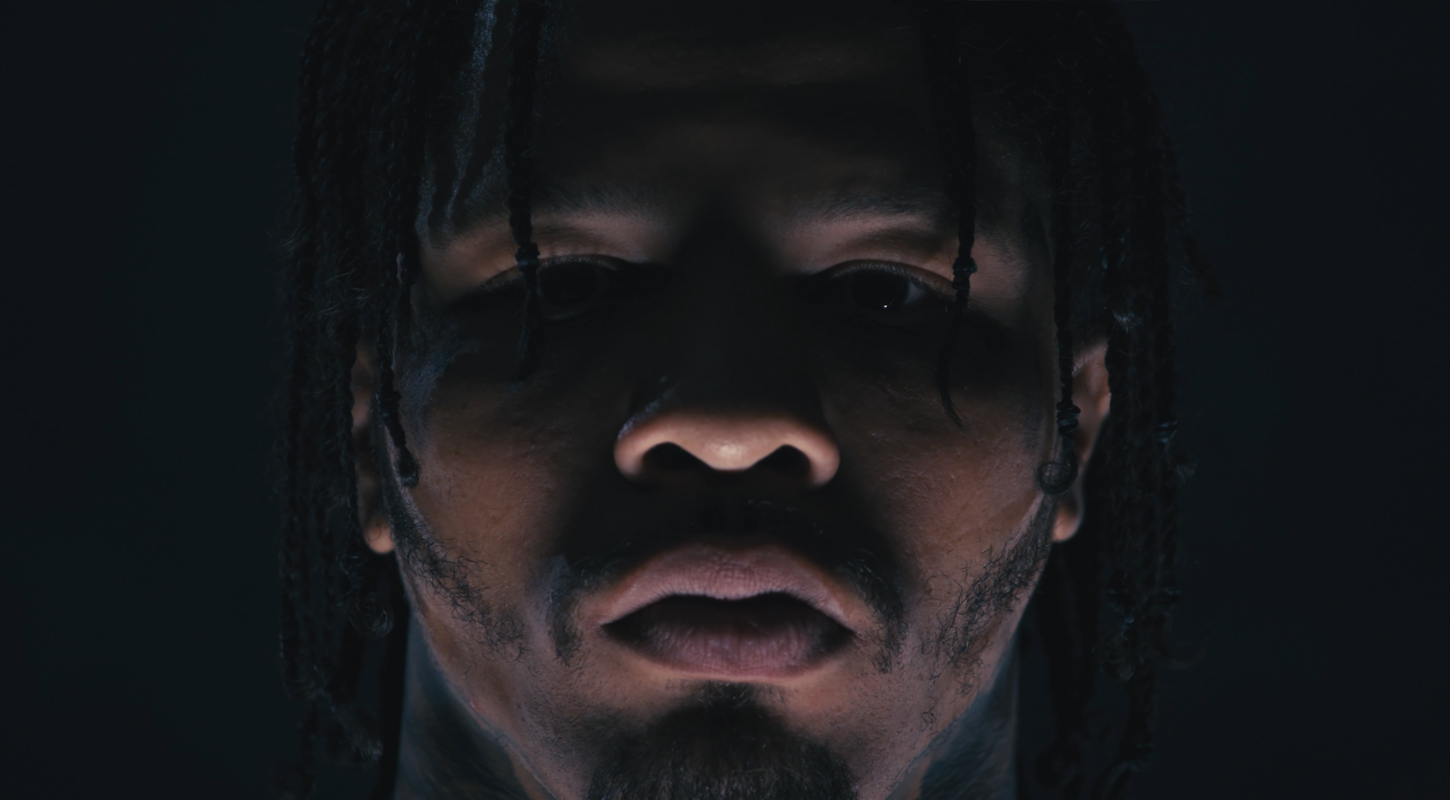 a stylized image of a close up of an African American professional boxer