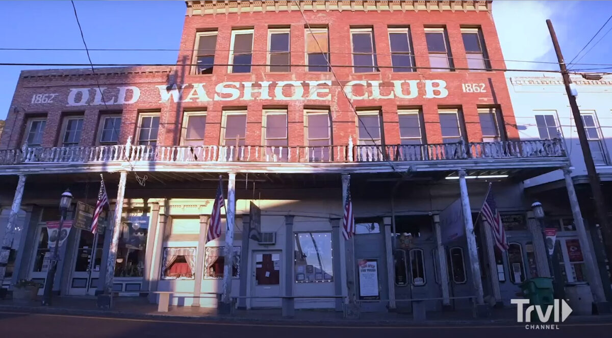 an old building , old Washoe club built in 1862 during a sunrise in Virginia city, it's a brick building