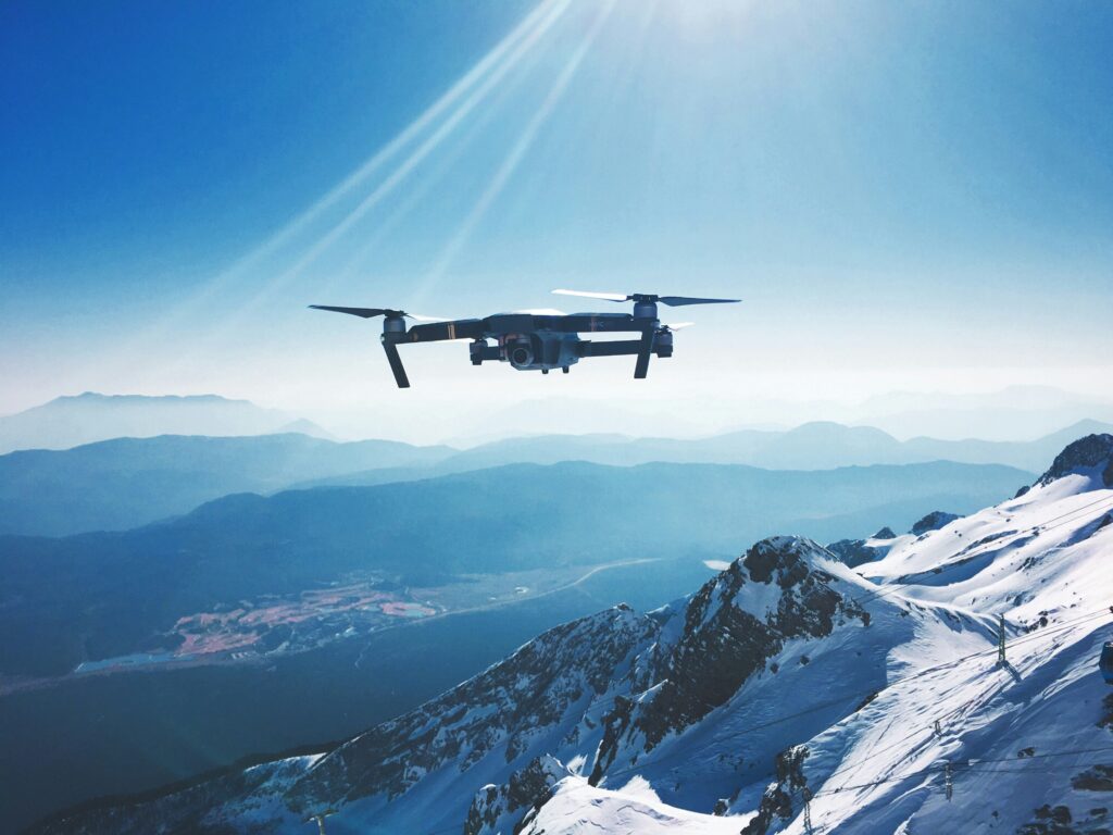 Drone in use to capture the visuals of a mountain