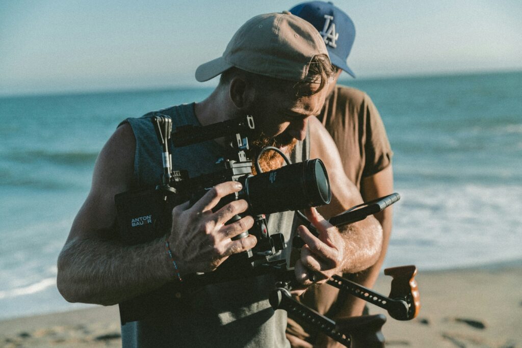 Man working with a team for better camera technique and visuals