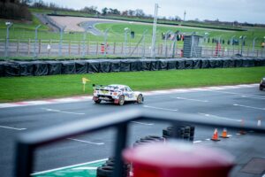 A race car speeding to finish the course