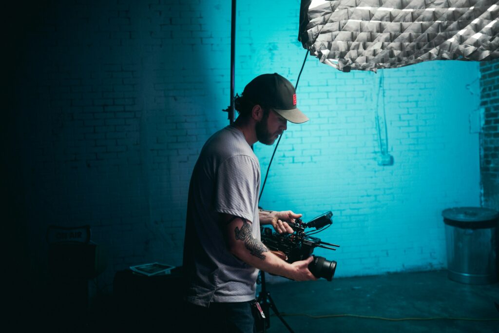 A video production crew positioning the camera to get the best angle