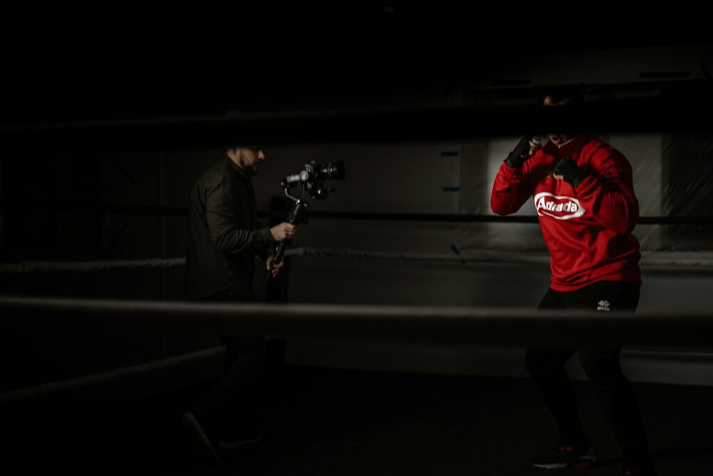 A video production director capturing the routine of an athlete