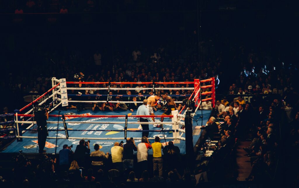 An active UFC fight around an active audience in Las Vegas