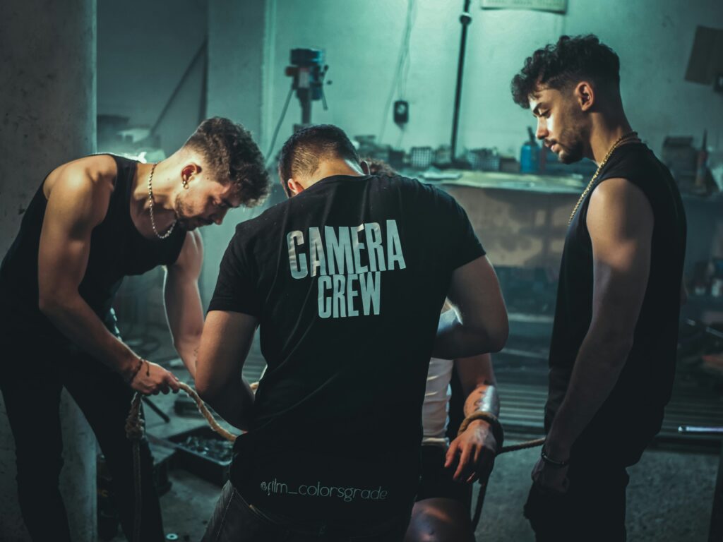 A camera crew team working together on a video production set