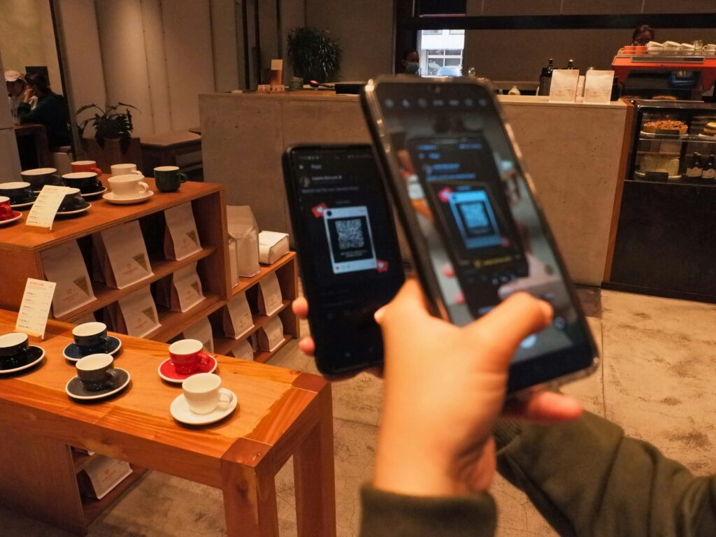 A customer scanning a QR code for convenience