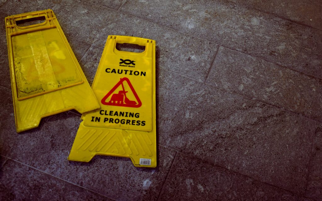 A broken warning sign on the streets