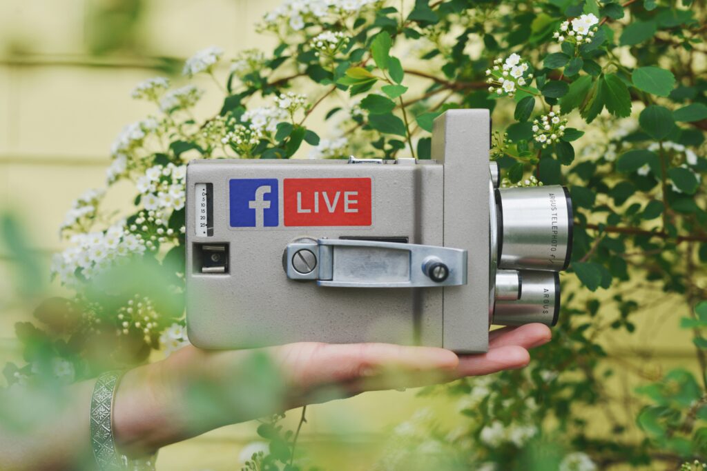 A camera prop showing a Facebook live icon