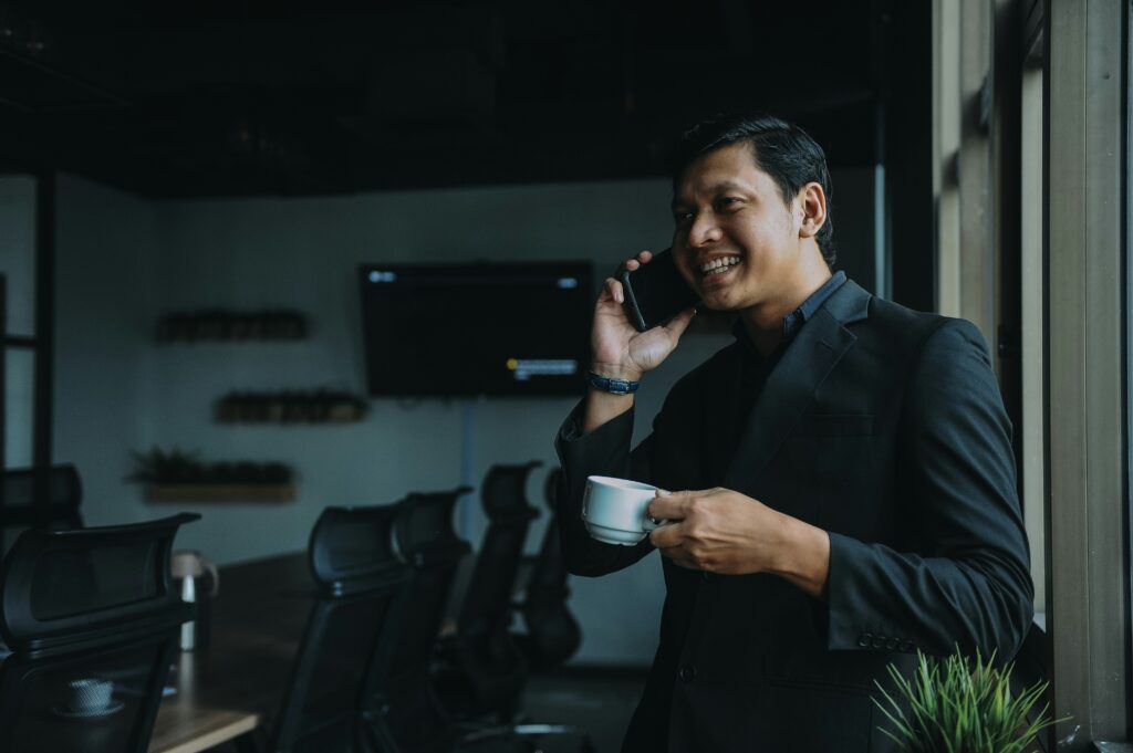 A businessman talking on the phone for crowdfunding