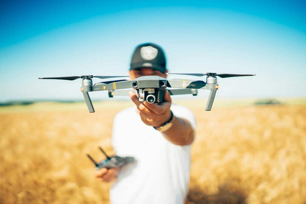 A crew member showing a new drone