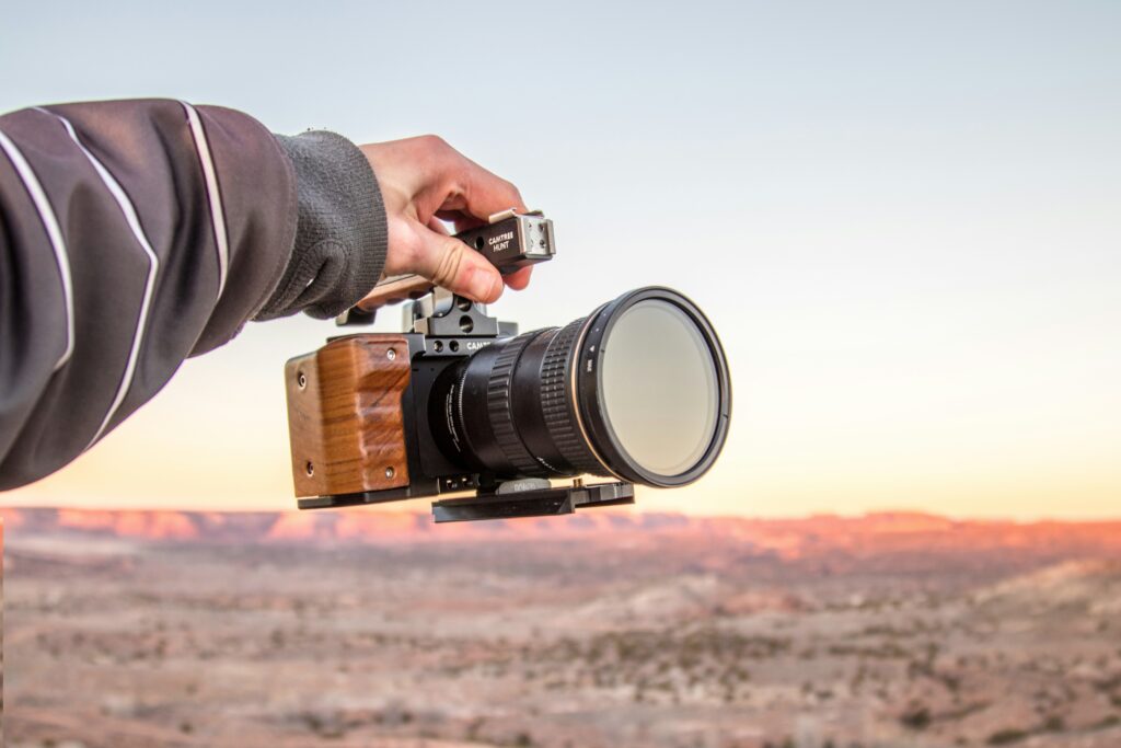 A video production crew holding a camera for time lapse