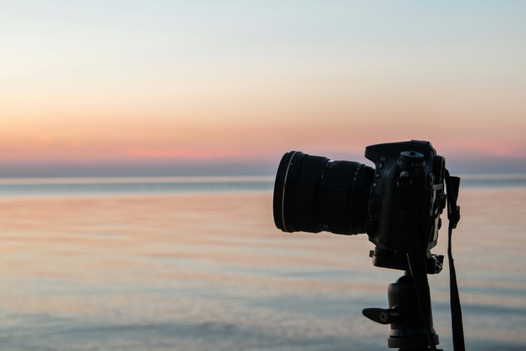 A camera placed near the ocean for sunset